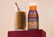 Costa Coffee introduces new Jaffa Cakes Frappé A bottle of Costa Coffee Frappé Jaffa Cakes stands next to a glass with the drink inside.