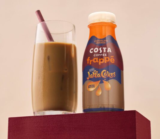 Costa Coffee introduces new Jaffa Cakes Frappé A bottle of Costa Coffee Frappé Jaffa Cakes stands next to a glass with the drink inside.