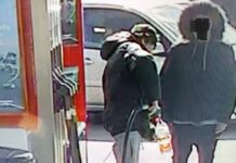 Fuel theft crime wave magnified by first-time offenders Two people stand at a forecourt fuel station as one of them fills up a plastic bottle with fuel to steal.