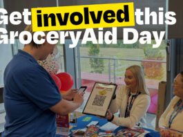 Rallying support for GroceryAid Day 2026 A person attends a Haribo stand to scan a QR code with the slogan 'Get involved this GroceryAid Day'.