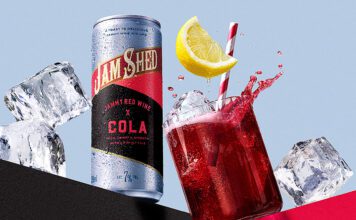 Jam Shed blends red wine and cola in a can Promotional image for the launch of Jam Shed Jammy Red Wine & Cola cans with a can of the drink next to a glass with the drink inside.