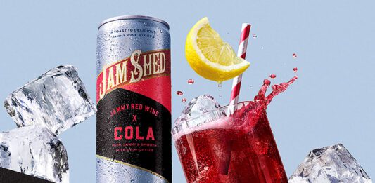 Jam Shed blends red wine and cola in a can Promotional image for the launch of Jam Shed Jammy Red Wine & Cola cans with a can of the drink next to a glass with the drink inside.