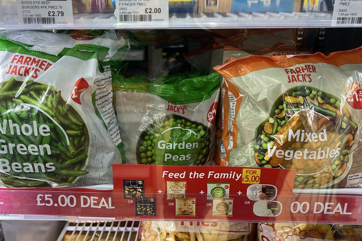 Image of a KeyStore shelf in the frozen aisle with Farmer Jack's Frozen Vegetables packs.