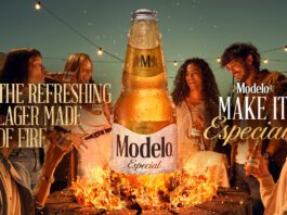 Modelo Especial launches across the UK Promotional image of the UK launch for Modelo Especial with people gathered round a campfire with a bottle of the beer rising out of the flames.