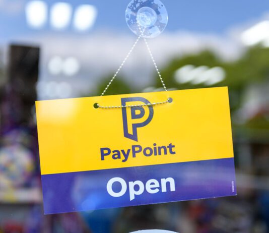 PayPoint invites retailers to take part in annual survey A door has a PayPoint open sign hanging on it.