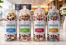 Stockleys broadens gifting options with Heritage Jars Stockleys Heritage Jars stand in a line against a tourist-themed background.