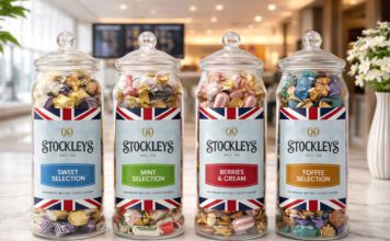 Stockleys broadens gifting options with Heritage Jars Stockleys Heritage Jars stand in a line against a tourist-themed background.