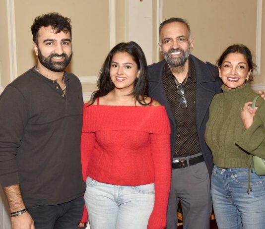 RaceTrack Pitstop marks 15th anniversary The Sud family stands together for an image.