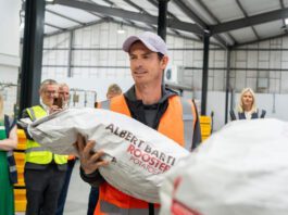 Andy Murray marks 20million meal milestone at Albert Bartlett Andy Murray stands holding a sack of potatoes with the Albert Bartlett logo on the bag.