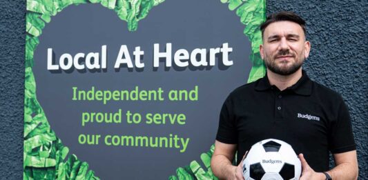 Booker Group launches summer football campaign Former Scotland player Robert Snodgrass has visited Booker symbol stores in Glasgow to encourage football fans to buy their match-day essentials from their local convenience retailer.