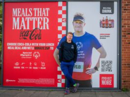 CCEP supports Special Olympics with Meals that Matter Angus Leckonby, Special Olympics GB Athlete, stands in front of the CCEP Meals that Matter promotional image which features him.