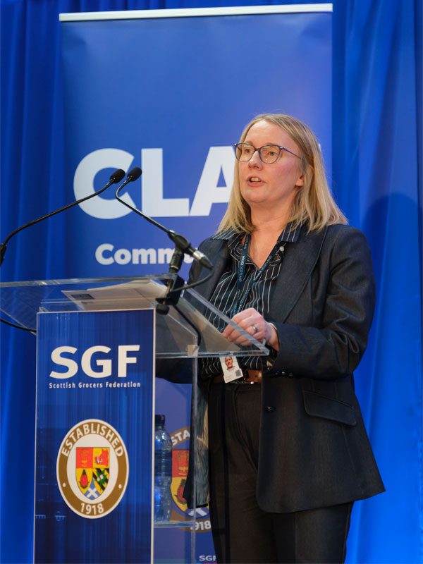 Inspector Emma Wright stands at a podium at the SGF's Crime Conference 2026.