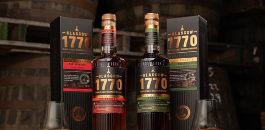Glasgow 1770 unveils Batch 3 of Cask Strength whisky series Bottles of Glasgow 1770 Batch 3 Unpeated and Peated Cask Strength stand on a whisky barrel with their outer packs next to them.