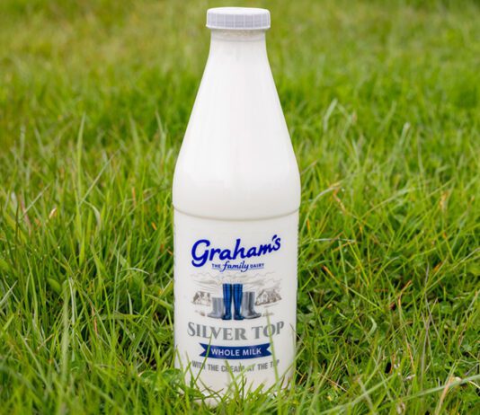Graham’s fuels traditional dairy demand with Silver Top milk A bottle of Graham's Silver Top milk stands in a grassy field.