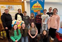 Healthy Living Programme feeds 786 pupils in Shetland Members of the Healthy Living Programme team stand with school pupils from a local primary school in Shetland.