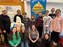 Healthy Living Programme feeds 786 pupils in Shetland Members of the Healthy Living Programme team stand with school pupils from a local primary school in Shetland.