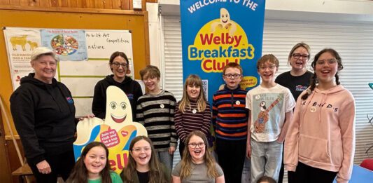 Healthy Living Programme feeds 786 pupils in Shetland Members of the Healthy Living Programme team stand with school pupils from a local primary school in Shetland.