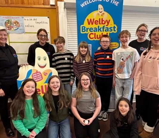 Healthy Living Programme feeds 786 pupils in Shetland Members of the Healthy Living Programme team stand with school pupils from a local primary school in Shetland.