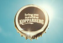 Kopparberg launches ‘Bring me Sunshine’ campaign for summer A bottle cap with the words 'bring me sunshine Kopparberg' stamped on it against a sunny sky background.