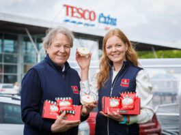 McGhee’s Empire Biscuit joins Tesco meal deal range Gordon McGhee and Aisling McGhee stand outside a Tesco supermarket store holding empire biscuits.