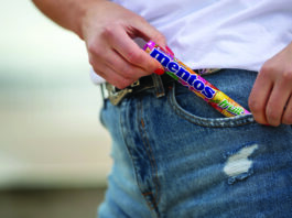 It Pays to be Singles-Minded Mentos in hand