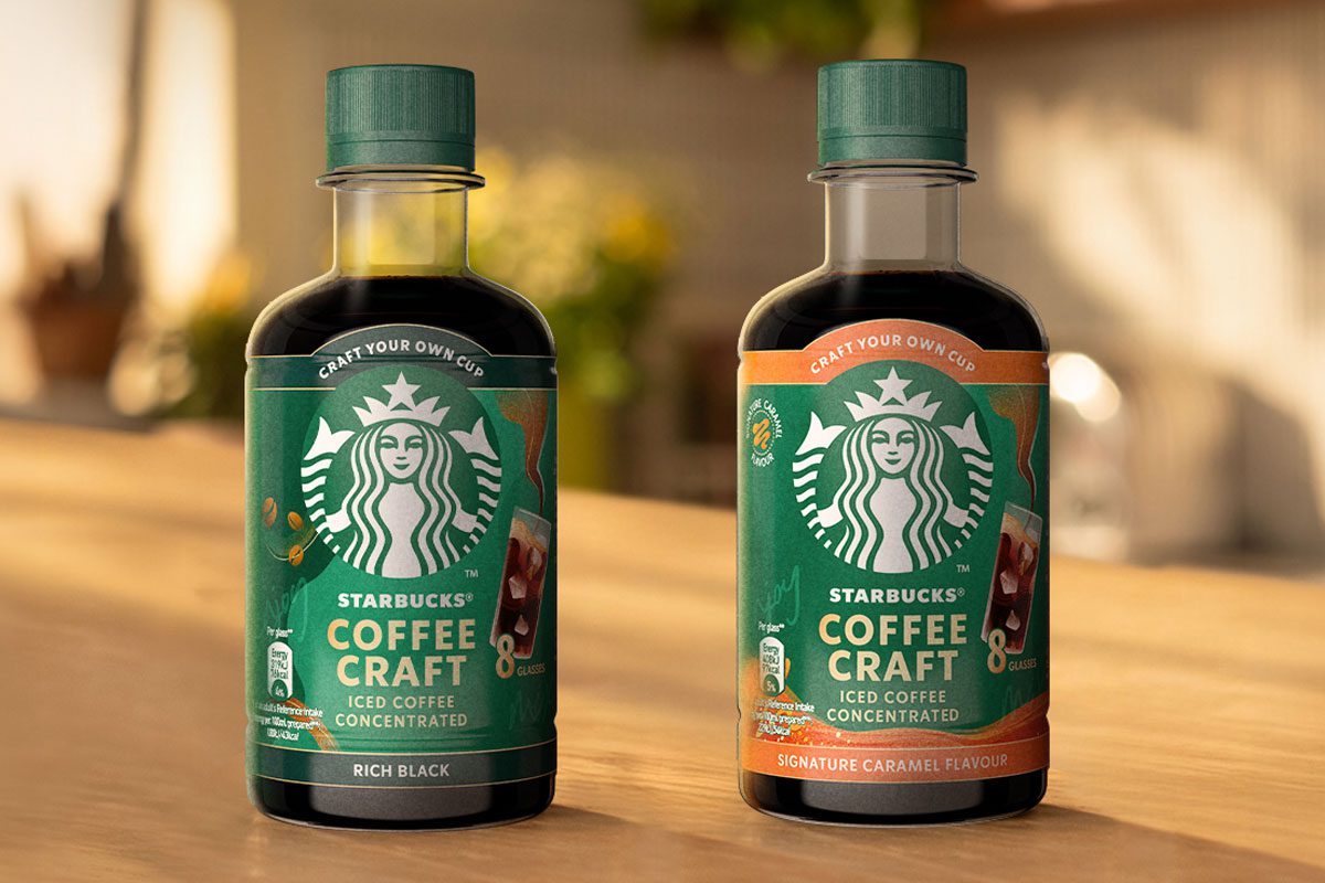Bottles of Starbucks Coffee Craft Rich Black and Signature Caramel flavours sit on a table.