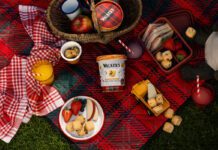 Walker’s Shortbread launches Wee Chunkies sharing tubs A picnic scene featuring the new Walker's Shortbread Wee Chunkies Chocolate & Salted Caramel Tub.
