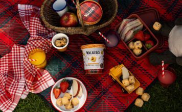 Walker’s Shortbread launches Wee Chunkies sharing tubs A picnic scene featuring the new Walker's Shortbread Wee Chunkies Chocolate & Salted Caramel Tub.