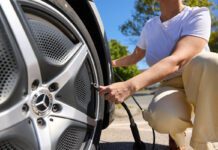Air-serv sees increase in tyre inflation checks across UK A woman inflates her tyre at a forecourt station.