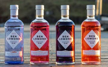 Ben Lomond Gin unveils new bottle design Bottles of the Ben Lomond Gin redesign for 2026 are lined up on a wooden pier.