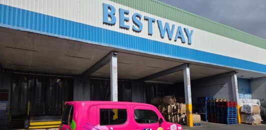 Fini builds UK distribution with new Bestway partnership A Fini branded car sits outside a Bestway Wholesale depot.