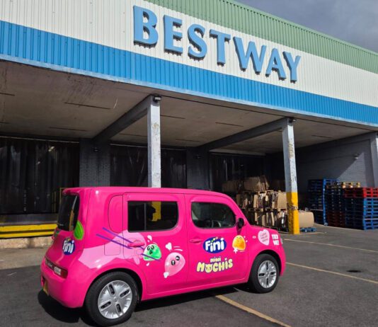 Fini builds UK distribution with new Bestway partnership A Fini branded car sits outside a Bestway Wholesale depot.