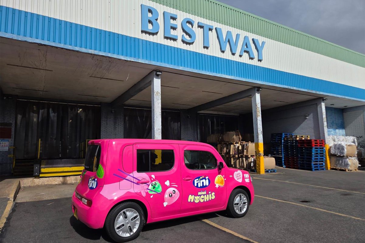 A Fini branded car sits outside a Bestway Wholesale depot.