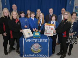 Spar Condorrat hits major LifeVac milestone Staff members from Spar Condorrat stands with primary school pupils from Whitelees along with staff members at the school.