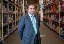 Bestway acquires Dee Bee Wholesale Dawood Pervez, managing director at Bestway Wholesale, stands in the middle of a wholesale aisle.