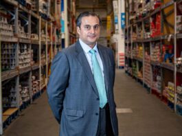 Bestway acquires Dee Bee Wholesale Dawood Pervez, managing director at Bestway Wholesale, stands in the middle of a wholesale aisle.