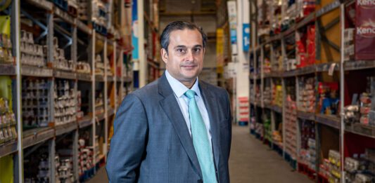Bestway acquires Dee Bee Wholesale Dawood Pervez, managing director at Bestway Wholesale, stands in the middle of a wholesale aisle.