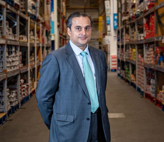 Bestway acquires Dee Bee Wholesale Dawood Pervez, managing director at Bestway Wholesale, stands in the middle of a wholesale aisle.