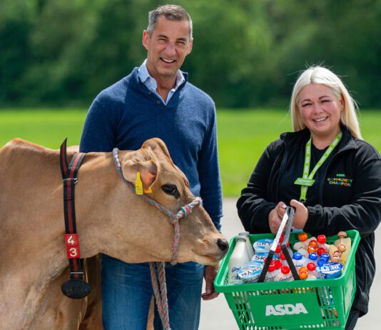 Graham’s Dairy lands new listings in Asda stores Robert Graham, managing director at Graham's The Family Dairy, stands next to Keira McTaggart, community champion at Asda Alloa, stand together as Robert has a cow next to him and Keira holds an Asda basket.