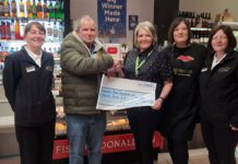Greens of Fraserburgh donates £1,000 to local community A group of people stand in Greens of Fraserburgh to present a cheque to a local charity group.