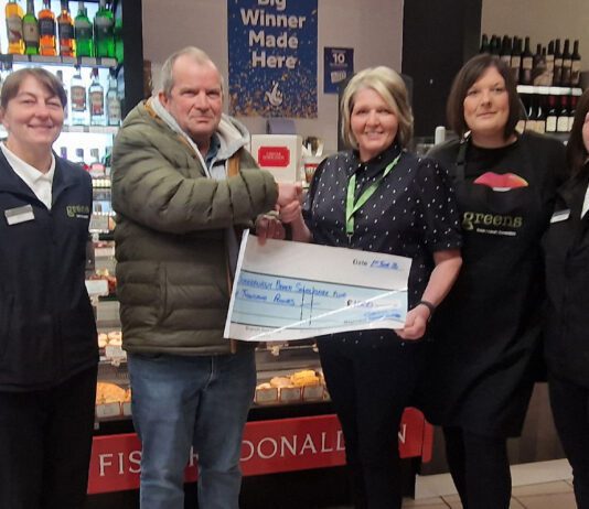 Greens of Fraserburgh donates £1,000 to local community A group of people stand in Greens of Fraserburgh to present a cheque to a local charity group.