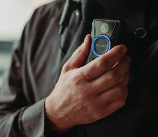 Abuse causes 90% of Scottish workers stress and anxiety A man with a HALOS bodycamera attached to the his chest.