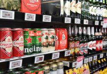 It’ll Cost You campaign drives home danger of proxy buying Bottles and cans of beers sit in a chiller in a store.