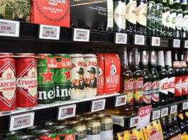It’ll Cost You campaign drives home danger of proxy buying Bottles and cans of beers sit in a chiller in a store.