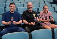 Pepsi Max kicks off new deal with Scotland football teams Scottish footballer Andy Robertson, Steve Clarke, head coach, and footballer Kathleen McGovern sit in Hampden Stadium seats holding cans of Pepsi Max.