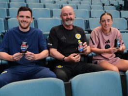 Pepsi Max kicks off new deal with Scotland football teams Scottish footballer Andy Robertson, Steve Clarke, head coach, and footballer Kathleen McGovern sit in Hampden Stadium seats holding cans of Pepsi Max.