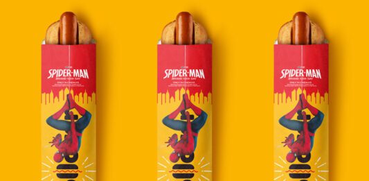 Rollover unmasks Spider-Man: Brand New Day promo Packs of Rollover Original Hotdog with the Spider-Man: Brand New Day promotion across them are set against a yellow background.