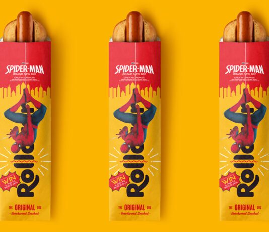Rollover unmasks Spider-Man: Brand New Day promo Packs of Rollover Original Hotdog with the Spider-Man: Brand New Day promotion across them are set against a yellow background.