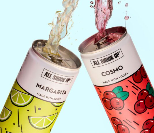 All Shook Up launches new cocktail cans Cans of All Shook Up Margarita and Cosmo are clinked together as the cocktails spill out the top of the cans against a blue background.
