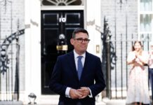 New Prime Minister must support retailers, says the Fed Prime Minister Andy Burnham stands outside No.10 Downing Street.